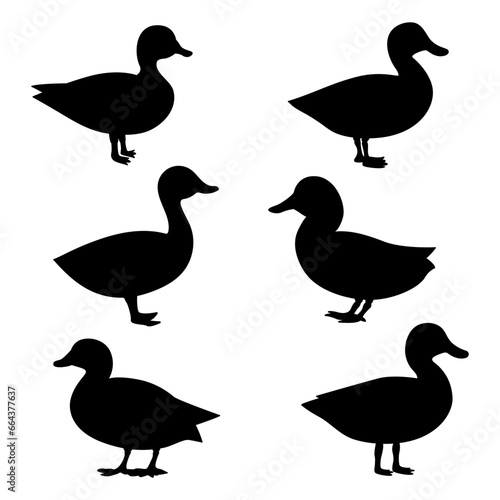 set of silhouettes of ducks