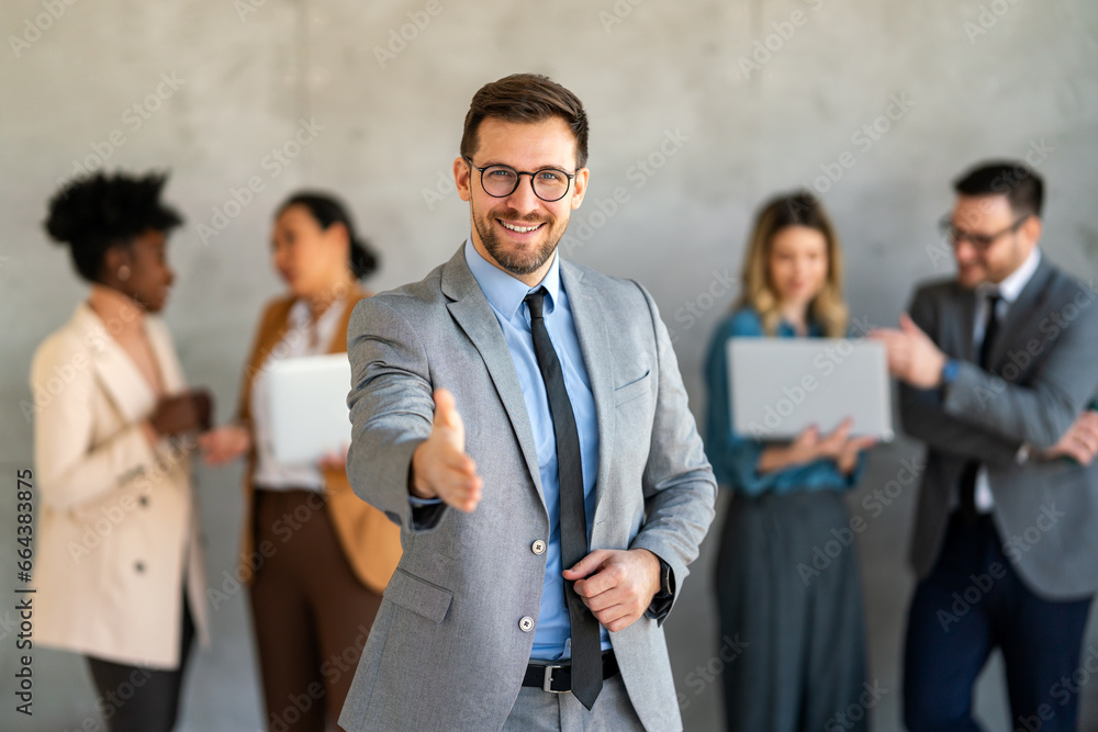 Group of successful multiethnic, diverse entrepreneurs and business people achieving goals together Group of successful multiethnic, diverse entrepreneurs and business people achieving goals together