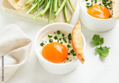 Fototapeta Naklejka Na Ścianę i Meble -  Eggs en cocotte (baked eggs)