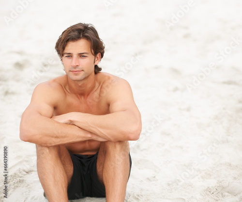 Man, shirtless and beach sand thinking on relax holiday, ocean vacation or tropical sunshine. Male person, wondering or swimwear for summer paradise or peace solitude for rest, sea calm or thought