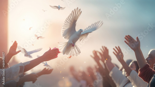 Demonstrators releasing white doves as a symbol of peace during a protest photo