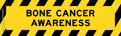 Yellow and black color with line striped label banner with word bone cancer awareness