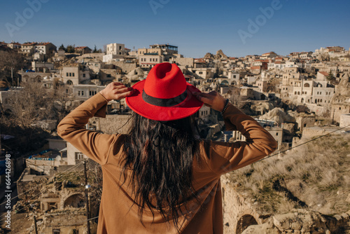 girl in a red hat in cappadocia photo