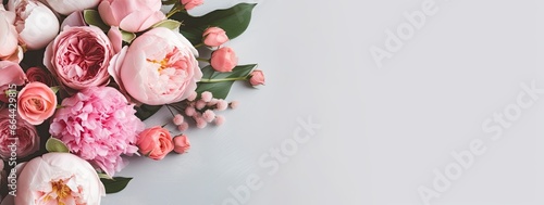 Fresh bunch of pink peonies and roses with copy space.