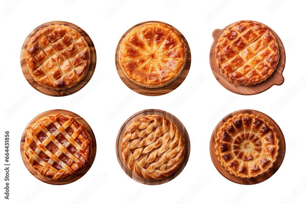 Collection of different tasty pies on wooden board isolated on transparent background, top view Collection of different tasty pies on wooden board isolated on transparent background, top view