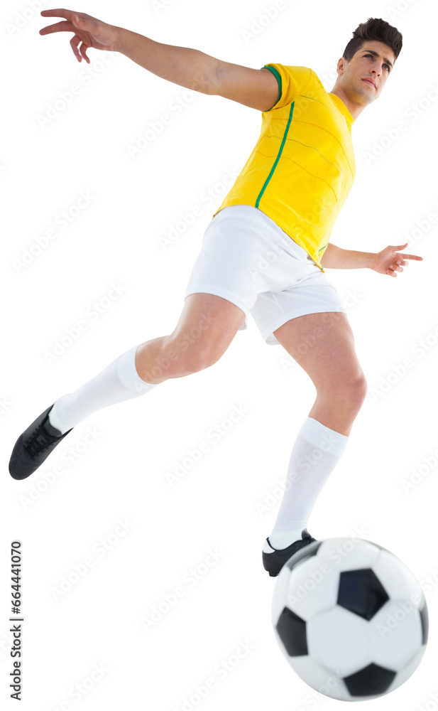 Digital png photo of focused football player kicking ball on transparent background