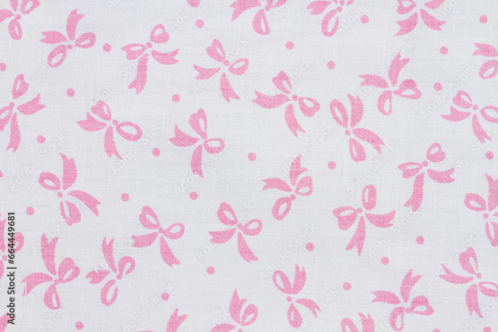 Pink and white bow textured fabric background Pink and white bow textured fabric background