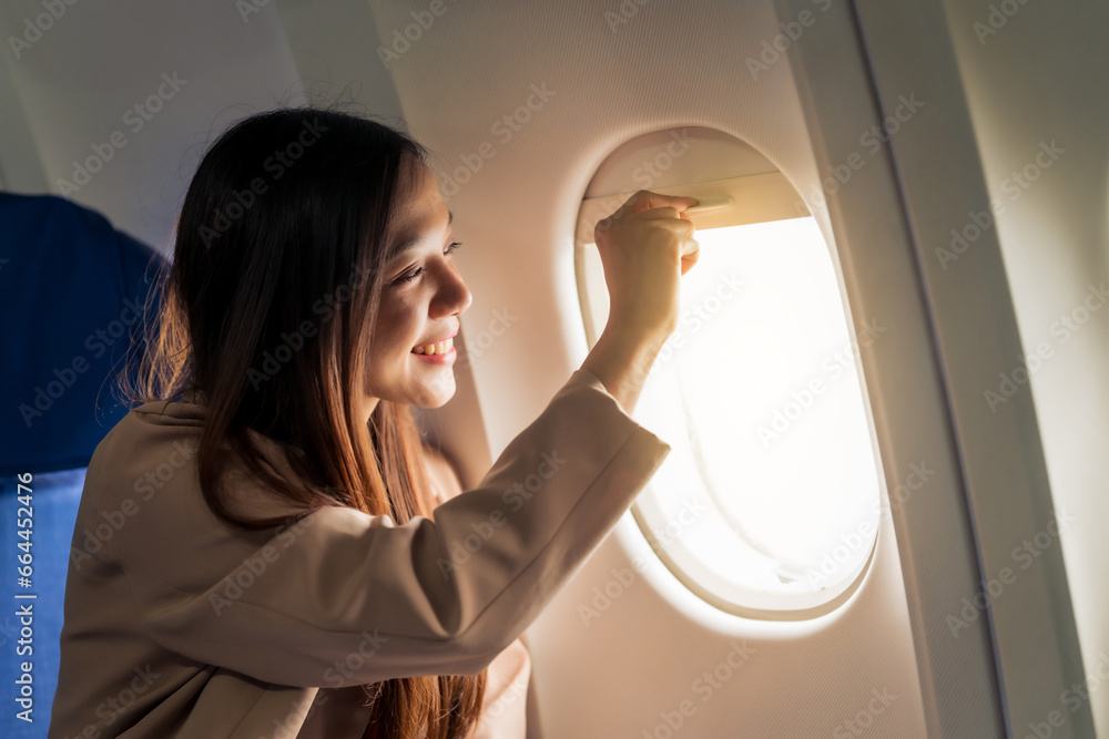 Female airplane passengers, study abroad, asian chinese people, foreign university student passengers preparing for overseas studies. dreams taking flight, global campuses await. english languages Female airplane passengers, study abroad, asian chinese people, foreign university student passengers preparing for overseas studies. dreams taking flight, global campuses await. english languages