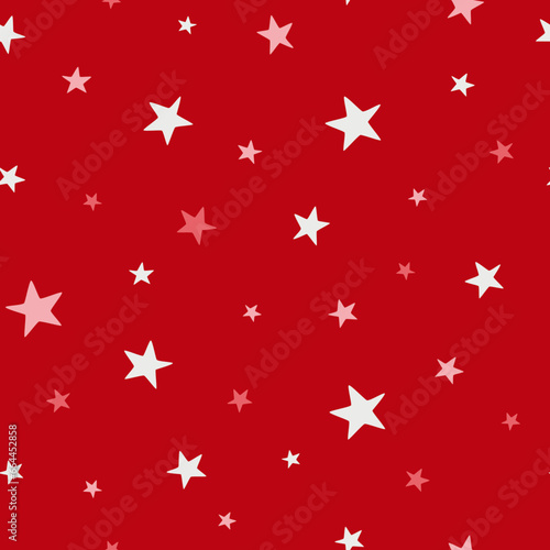 Christmas and winter themed seamless pattern, with white and pink stars on red background
