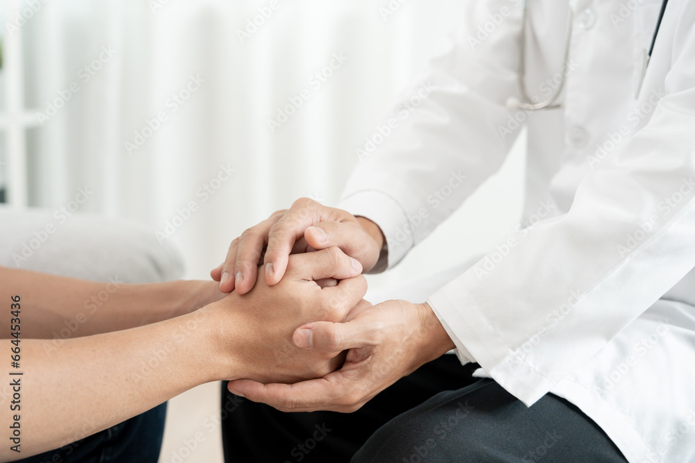 psychiatrist hold hand support each while discussing family issues. doctor encourages and empathy woman suffers depression. psychological, save divorce, Hand in hand together, trust, care psychiatrist hold hand support each while discussing family issues. doctor encourages and empathy woman suffers depression. psychological, save divorce, Hand in hand together, trust, care