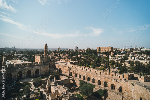 Tower of David the old city walls of Jerusalem Israel against the sky. The tower of David is an ancient citadel located near the Jaffa gate at the entrance To the old city in Jerusalem,