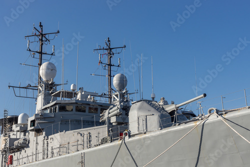Modern weapons on the deck of a military ship photo