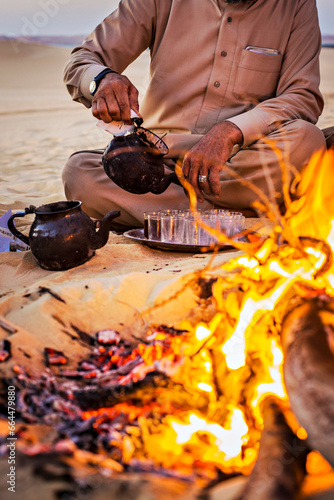 Bedouin tea on the fire in Sahara desert, Egypt photo