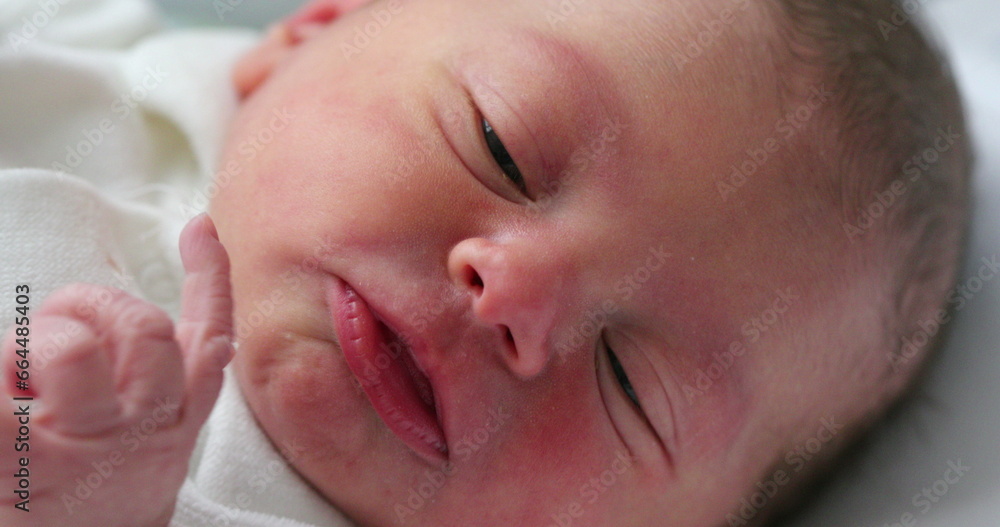 Close-up of baby face in first day of life Close-up of baby face in first day of life