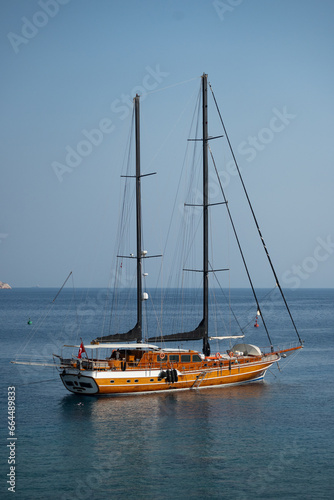 Beautiful wooden sail boat anchored by the coast of Datça, Turkey