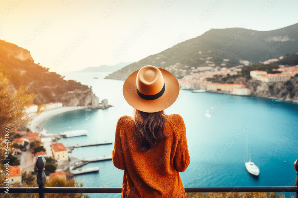Serene Coastal Beauty: Woman in Sun Hat