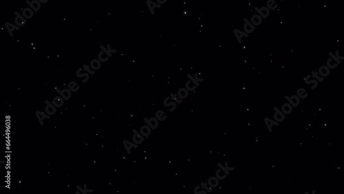 Alpha channel video of tiny particles slowly moving through space like stars or fireflies