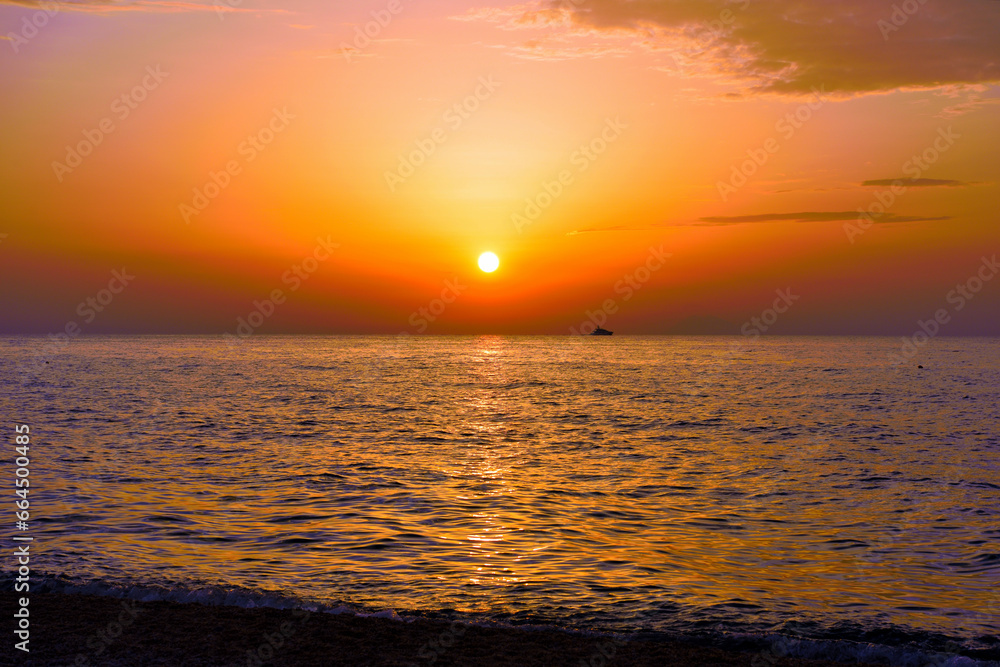 Naklejka premium sunset over the sea in marina di zambrone tropea calabria italy