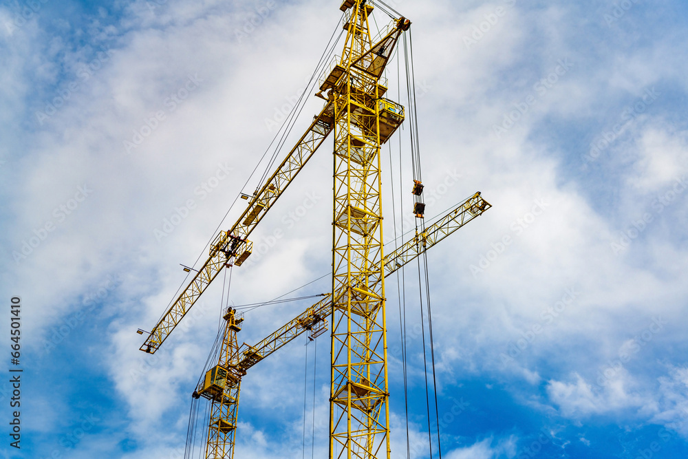 Construction site background. Construction crane against the sky.
