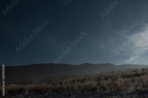 Winter landscape on the Sayan Mountains located in Siberia near Lake Baikal