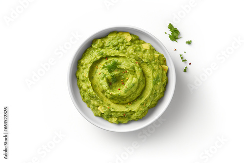 Guacamole in souce bowle on white background, top view