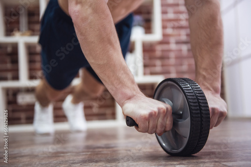 Guy working out at home