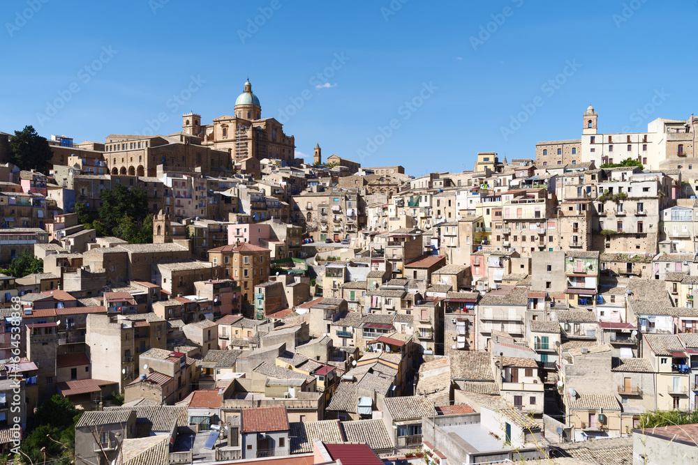 View of Piazza Armerina, a town in Enna province, Sicily, Italy. The Maria Santissima delle Vittorie Cathedral is shown on top.