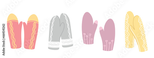 Woolen or knitted mittens for cold frosty weather isolated on white background. Warm winter mittens set. Cute hand drawn elements for winter design. Set of different knitted mitten. Winter accessories