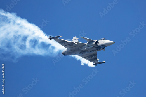 Quadro em tela Military fighter jet plane at air base