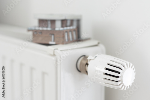 House model on the heating radiator.