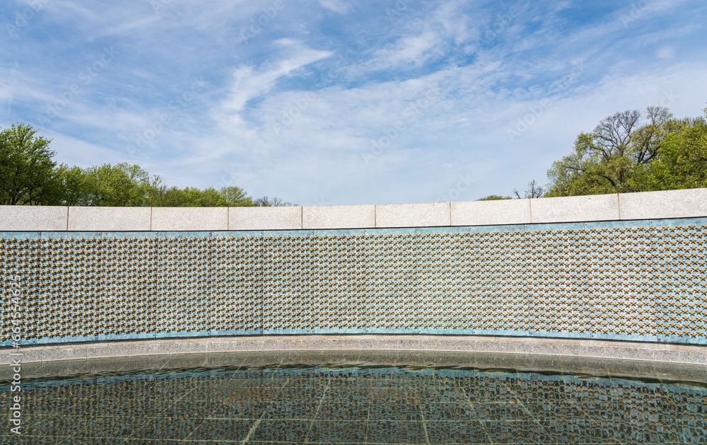 The Freedom Wall with gold stars in the World War II Memorial and reflection pool, Washington, D.C., USA.