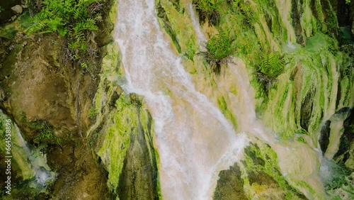 Amazing air survey of Bilawa Hot Waterfall. Davao de Oro, Philippines. photo