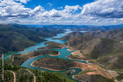 Abstract landscape of Sabor lake, Tras os Montes and Alto Douro, Portugal. Drone vision, aerial view of Serpente do Medal, Sabor River, tourist attraction and travel destination in Northern Portugal. photo