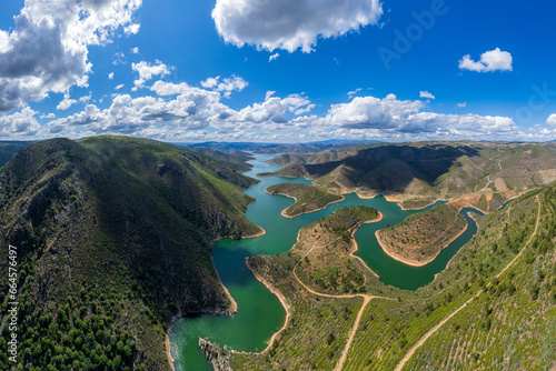 Abstract landscape of Sabor lake, Tras os Montes and Alto Douro, Portugal. Drone vision, aerial view of Serpente do Medal, Sabor River, tourist attraction and travel destination in Northern Portugal. photo