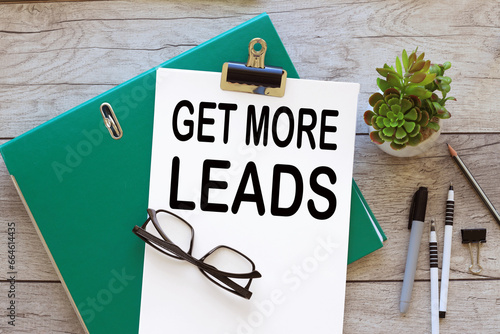 Wallpaper Mural Get More Leads Copy space. text on white a4 paper. green folder Torontodigital.ca