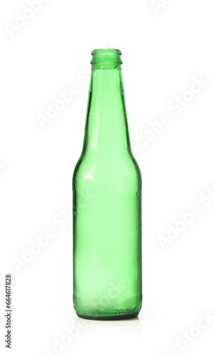 One opened empty green glass bottle isolated on white background
