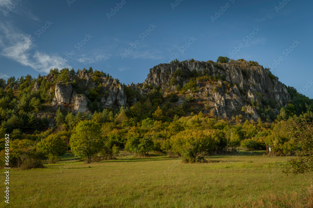 Fototapeta premium Meadows and hills in Strazovske hills in autumn cloudy day with green colors