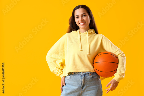 Young woman in hoodie with ...