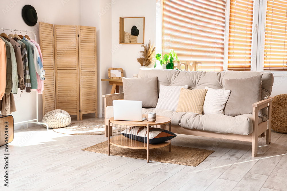 Obraz premium Interior of stylish living room with couch and table