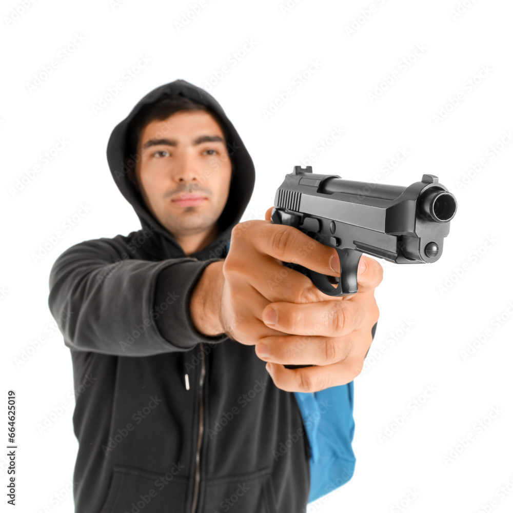Male student with gun on white background. School shooting concept Male student with gun on white background. School shooting concept