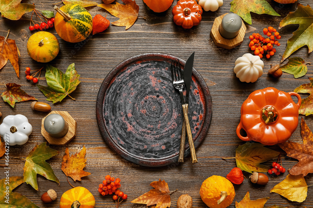 Beautiful table setting for Thanksgiving Day celebration on wooden background Beautiful table setting for Thanksgiving Day celebration on wooden background