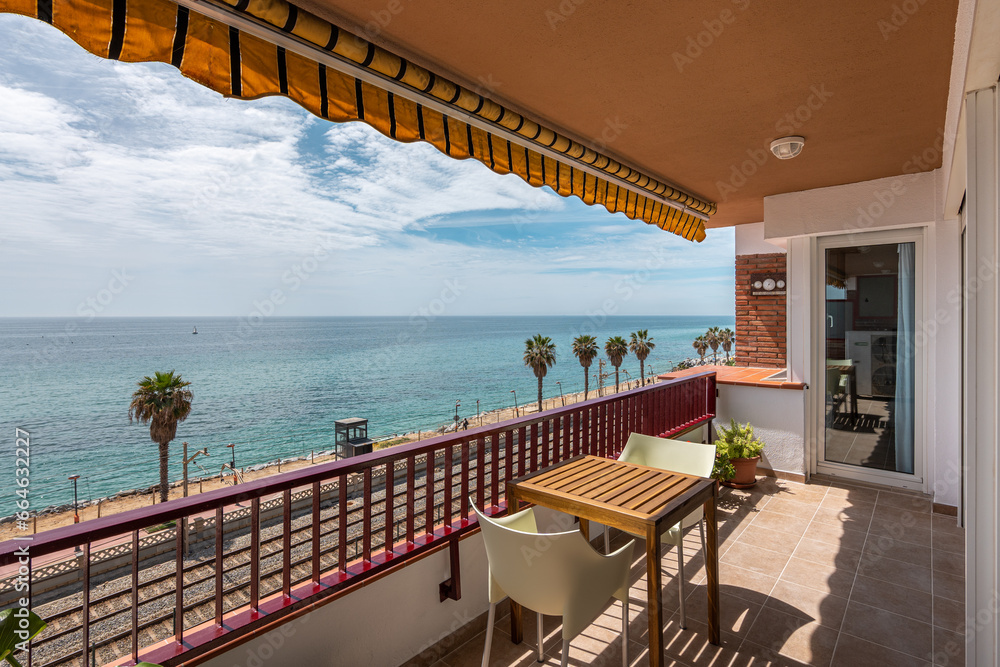 custom made wallpaper toronto digitalTerrace with table against city beach in Vilassar de Mar