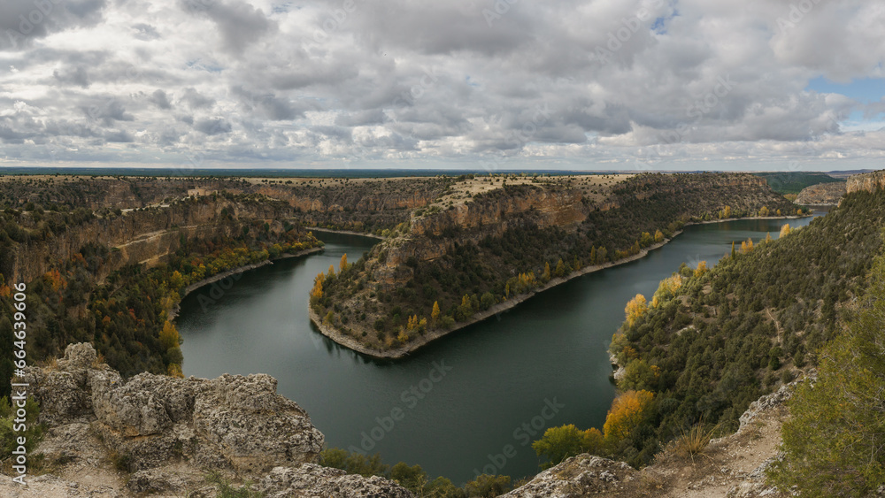River bend of Rio Duraton during autumn time in Hoces del Duraton natural park near Sepulveda, Segovia, Spain