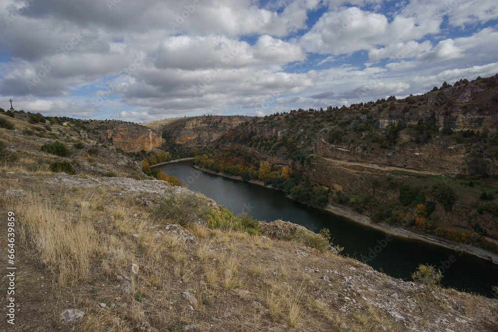 Fototapeta premium View into the canyon of River Duraton during autumn time in Hoces del Duraton natural park near Sepulveda, Segovia, Spain