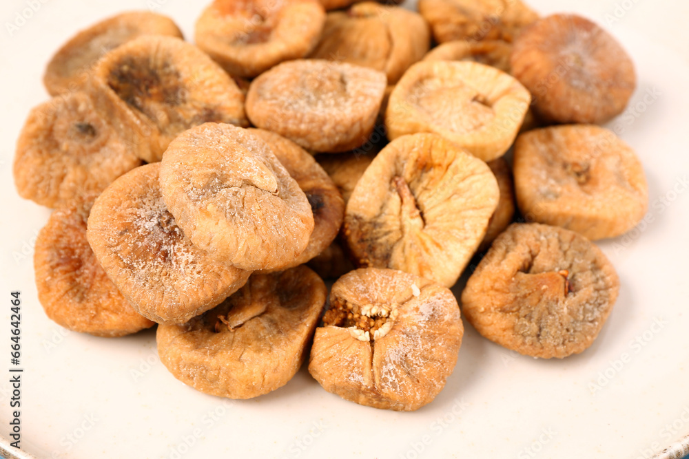 Sweet dried figs on white background, closeup Sweet dried figs on white background, closeup