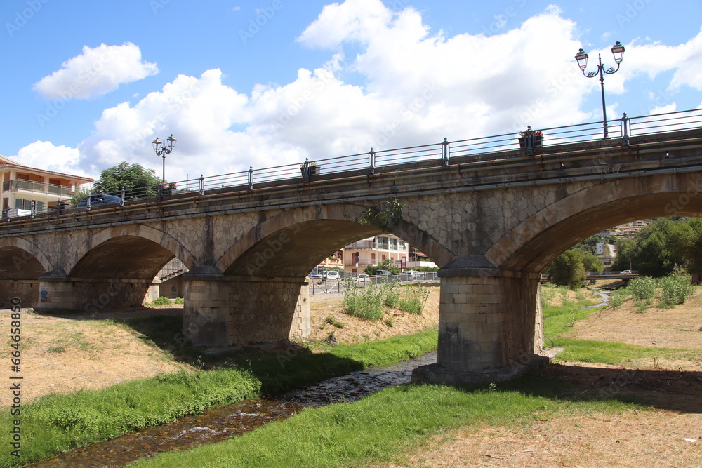 Fototapeta premium view of the town of Diamante, Cosenza, Calabria, Italy with famous bridge over the river that flows into the sea