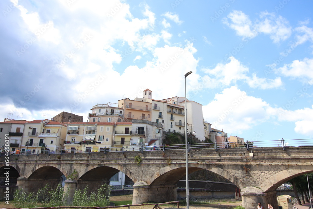 
view of the town of Diamante, Cosenza, Calabria, Italy with famous bridge over the river that flows into the sea