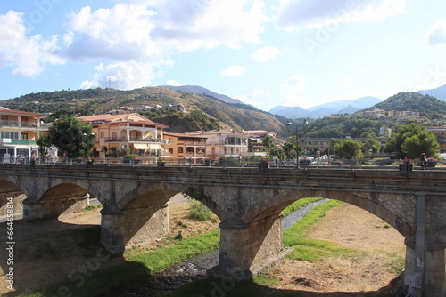 
view of the town of Diamante, Cosenza, Calabria, Italy with famous bridge over the river that flows into the sea