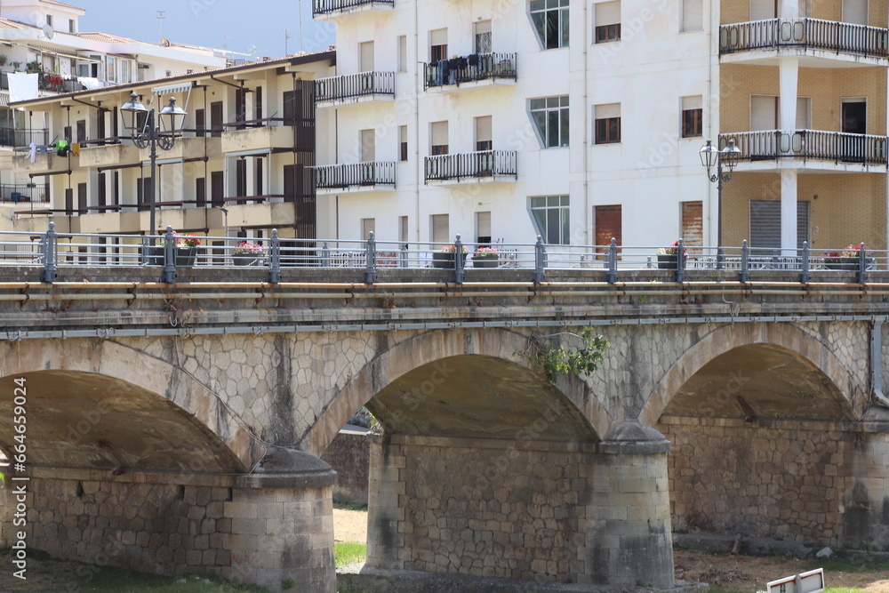 
view of the town of Diamante, Cosenza, Calabria, Italy with famous bridge over the river that flows into the sea