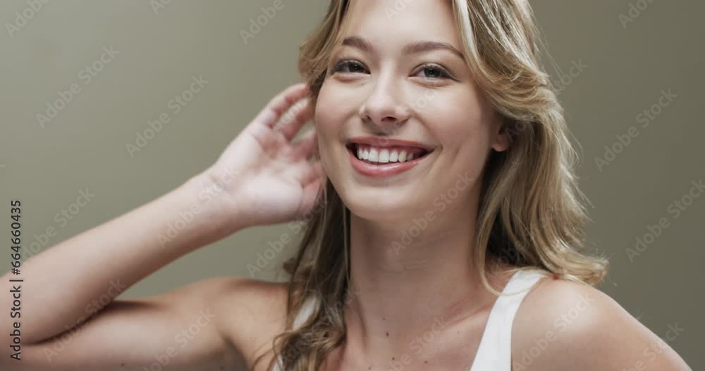 Portrait of smiling caucasian woman with blond hair, copy space, slow motion Portrait of smiling caucasian woman with blond hair, copy space, slow motion
